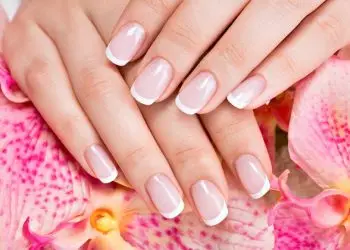 Beautiful woman's nails with beautiful french manicure