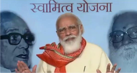 Pm मोदी ने बांटा संपत्ति कार्ड 1 modi