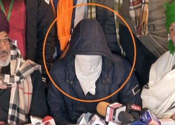 watch farmers at singhu border present masked man who alleged shootout plot to disrupt tractor rally on jan 26