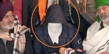 watch farmers at singhu border present masked man who alleged shootout plot to disrupt tractor rally on jan 26
